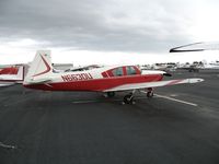 N6630U @ HWD - 1963 Mooney M20D at stormy Hayward Air Terminal, CA - by Steve Nation