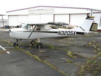 N3205X @ HWD - 1960 Cessna 150G at stormy Hayward Air Terminal, CA - by Steve Nation