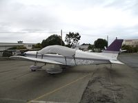 N2243P @ HWD - 1979 Piper PA-28-181 under tarp at stormy Hayward Air Terminal, CA - by Steve Nation