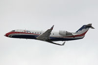 N947SW @ LAX - Skywest Airlines N947SW (Bombardier CRJ-200ER) - FLT SKW6574 - departing LAX RWY 25R on a very cloudy day enroute to Albuquerque International Airport (KABQ), New Mexico.