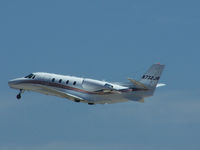 N732JR @ PDK - Departing PDK - Starting to rotate gear. - by Michael Martin