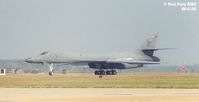 86-0105 @ LFI - The Bone leaves the hot ramp for her demo, taxiing by show-center