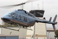 N16728 @ SMO - Helicopter N16728 arriving to pick up more passengers for a ride at Santa Monica Municipal Airport (KSMO)