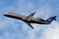 N924SW @ LAX - United Express N924SW departing LAX RWY 25R.