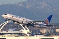 N26208 @ LAX - Continental Airlines N26208 departing LAX RWY 25R on a late afternoon in January 2006. - by Dean Heald