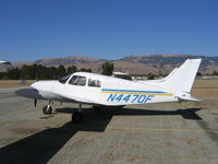N4470F @ E16 - Nice looking Piper PA-28-140 in summer sun at South County Airport, San Martin, CA - by Steve Nation