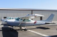 N9334R @ E16 - Cessna TR182 in summer sun at South County Airport, San Martin, CA - by Steve Nation