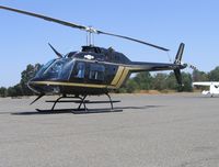 N969W @ RIU - San Joaquin Helicopters 1978 Bell 206B between lifting firefighters to mountain blaze @ Rancho Murieta Airport, CA - by Steve Nation