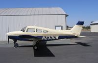 N2330W @ 1O3 - Smartly painted 1965 Beech A23 Muskateer @ Lodi Airport, CA - by Steve Nation