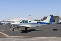 N855R @ 1O3 - 1959 Beech 35-33 Bonanza rolling @ Lodi Airport, CA - by Steve Nation