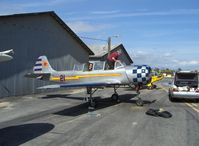 N6294D @ SZP - 1983 Yakovlev Yak 52, Vedeneev (Ivchenko) M-14P 360 Hp radial, preflight, parachute worn - by Doug Robertson