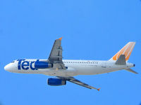 N467UA @ KLAS - Ted Airlines / 2002 Airbus Industrie A320-232 / Photo taken thru an Orion 80mm telescope with a 40mm eyepiece with my Canon G5 Powershot at normal settings. - by SkyNevada - Brad Campbell