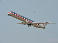 N596AA @ KLAS - American Airlines / 1992 Mcdonnell Douglas DC-9-83(MD-83) / Taken thru an Orion f/5 80mm telescope, 40mm EP @ 10x with a Canon G5 Powershot set to Auto. - by SkyNevada - Brad Campbell