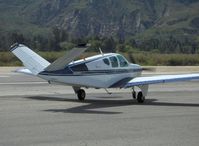 N988RR @ SZP - 1959 Beech M35 BONANZA, Continental IO-470-C 250 Hp, taxi to Runway 04 - by Doug Robertson