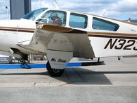 N323U @ WVI - close-up of Ms. Stress titles on gear door of Beech V35 @ Watsonville Municipal Airport, CA - by Steve Nation