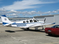 N6926R @ WVI - 1984 Beech B36TC in late afternoon sun with red corvette @ Watsonville Municipal Airport, CA - by Steve Nation