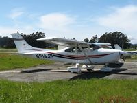 N914JB @ WVI - 2000 Cessna 182Sin late afternoon sun with red corvette @ Watsonville Municipal Airport, CA - by Steve Nation