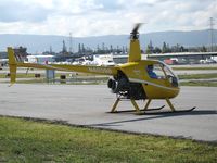 N40398 @ SQL - 1990 Robinson R22 Beta ready for liftoff @ San Carlos Airport, CA in rare spring 2006 sunshine - by Steve Nation