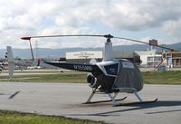 N155MB @ SQL - 1990 Robinson R22 BETA under wraps @ San Carlos Airport, CA in rare spring 2006 sunshine - by Steve Nation
