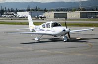 N824JA @ SQL - JATO Aviation 2004 Cirrus Design SR22 doing final checklist @ San Carlos Airport, CA in rare spring 2006 sunshine - by Steve Nation