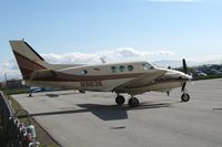 N983K @ SQL - skydiving-equipped 1966 Beech 65-A90 King Air w/parachute logo @ San Carlos Airport, CA in rare spring 2006 sunshine - by Steve Nation