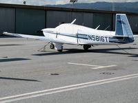 N5816T @ SQL - 1985 Mooney M20J under wraps @ San Carlos Airport, CA in rare spring 2006 sunshine - by Steve Nation