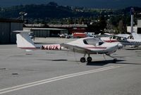 N402KT @ SQL - 1995 Diamond Aircraf DA 20 A-1 @ San Carlos Airport, CA in rare spring 2006 sunshine - by Steve Nation