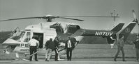 N117UV @ DAN - Univ.Va.Med.Center Helo in May 1985 picking up patient and fuel in Danville Va. - by Richard T Davis