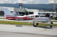 N6780X @ SQL - 1961 Cessna 310F turning onto active runway @ San Carlos Airport, CA in rare spring 2006 sunshine - by Steve Nation