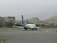 ZK-FRE @ ZQN - B737-300 taxiing to the runway - by Micha Lueck