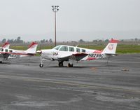 N8299C @ APC - 1991 Beech A36 Bonanza in old JAL colors @ on rainy Japan AL/IASCO A/S ramp Napa County Airport, CA - by Steve Nation