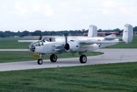 N25NA @ DPA - Taxiing in to the ramp during an air show - by Glenn E. Chatfield