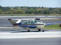 N8642M @ PDK - V-tail taxing to runway 2L - by Michael Martin