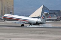 N9616G @ LAS - American Airlines N9616G (FLT AAL1417) - 1997 MD-83 - touching down on RWY 25L after a 3-1/2 hr flight from Chicago O'Hare (KORD). - by Dean Heald