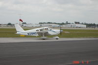 N28ND @ KLAL - Piper Cherokee II taxiing post-flight at Sun 'N Fun 2006 - by Alex Melia