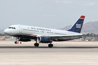 N839AW @ LAS - US Airways N839AW (FLT AWE736) touching down on RWY 25L after a 51-minute flight from San Diego, CA (KSAN). - by Dean Heald