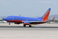 N700GS @ LAS - Southwest Airlines N700GS - 1997 Boeing 737-7H4 touching down on RWY 25L