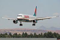 N673AW @ LAS - America West FLT AWE64 on short-final to RWY 25L after a 42-minute flight from Phoenix Sky Harbor Int'l (KPHX) - Phoenix, Arizona. - by Dean Heald
