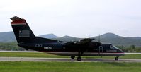 N827EX @ KROA - Taxiing to the active 24 - by Peter Steinmaker