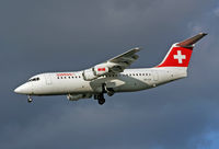 HB-IXX @ LHR - Avro RJ100 - by Les Rickman