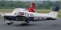 N5197F @ DAN - 1976 Piper PA-28-181 taxis in for fuel in Danville Va - by Richard T Davis