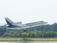 N331EX @ PDK - Departing PDK - Starting to rotate gear. - by Michael Martin