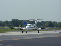 N976KC @ PDK - Taxing to Epps Air Service - by Michael Martin