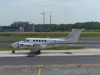 N976KC @ PDK - Taxing from Epps Air Service - by Michael Martin