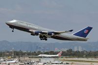 N173UA @ LAX - United Airlines N173UA (747-422) - Flight UA899 - climbing out from LAX RWY 25R for Narita International Airport (RJAA), Japan. - by Dean Heald