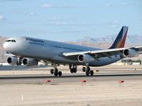 F-OHPK @ KLAS - Philippine Airlines / Airbus Industrie A340-313 - Landing RWY 25L - by Brad Campbell