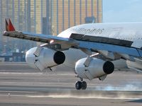 F-OHPK @ KLAS - Philippine Airlines / Airbus Industrie A340-313 - Landing RWY 25L - by Brad Campbell