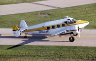 N9669R @ DPA - Taxiing by the control tower - by Glenn E. Chatfield