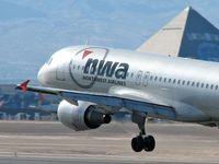 N355NW @ KLAS - Northwest Airlines / 1998 Airbus Industrie A320-212 - by SkyNevada - Brad Campbell
