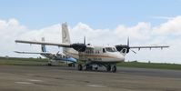 DQ-FEY @ NAN - Sun Air's Twin Otter FEY at its base in Nadi. DQ-FHG of Air Wakaya in the background - by Micha Lueck